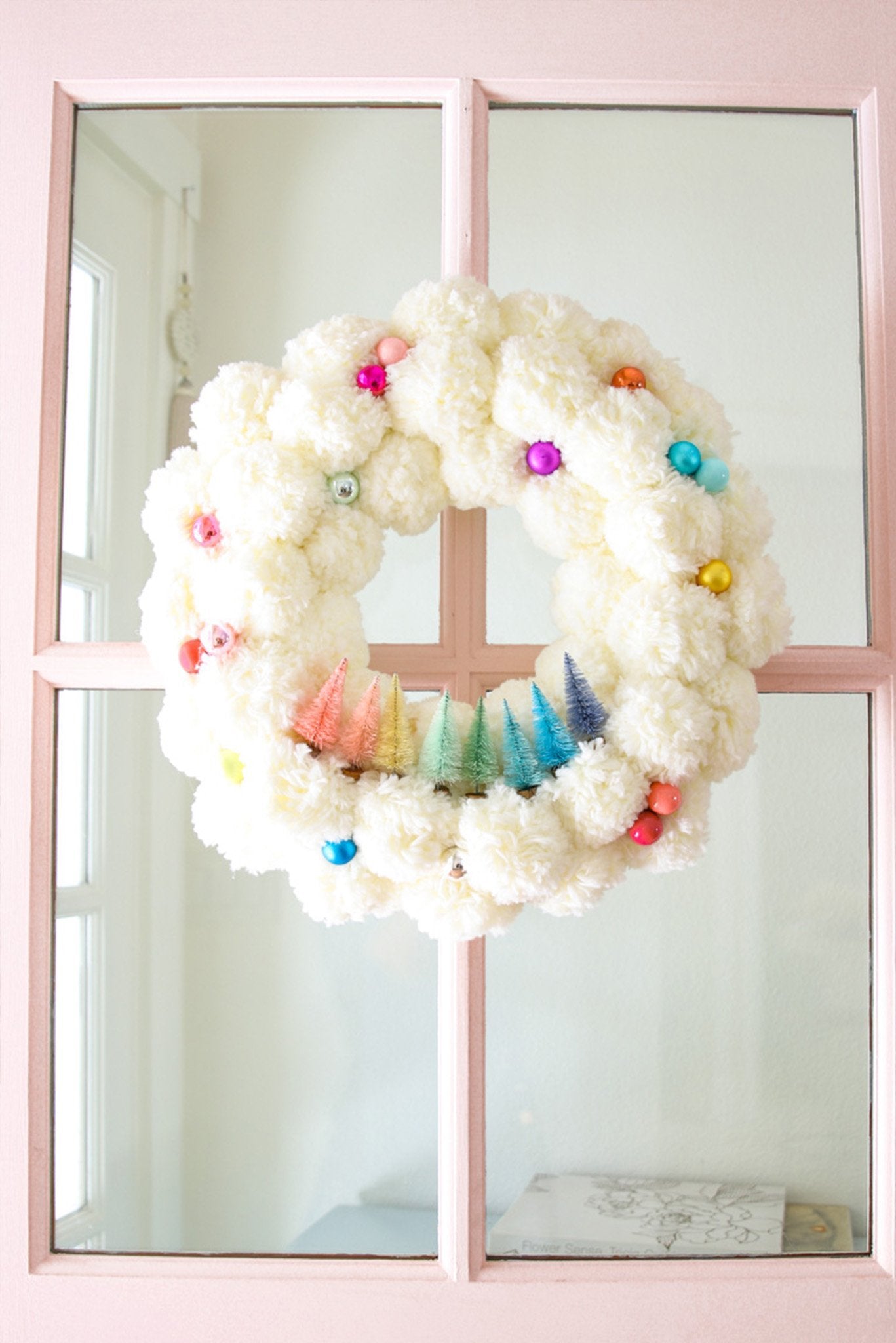 5 Festive DIY Pom Pom Wreaths to Make This Holiday Season - Pretty Collected